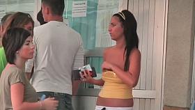 Hot babes in short shorts walk the street before a hidden cam
