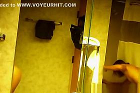 Small boobs girl caught in bathroom undressing