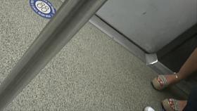 Young brunette, sexy legs in wedges heels