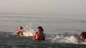 Curly blonde at the toilet