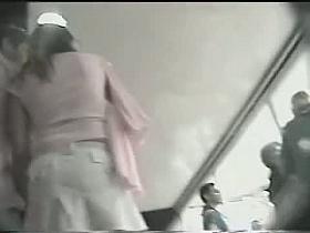 Hot asses in short skirts viewed by an upskirt hidden cam