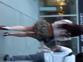 Sexy legs woman in short skirt upskirt