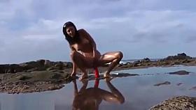 Hotkinkyjo Fucks Huge Dildos on the Beach