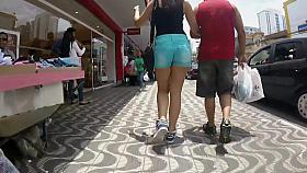 Hot ass in tights on the moving stairs