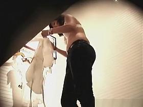 Girl tries on a new shirt