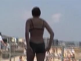 Babe fixing her candid bikini panty on the firm ass 04v