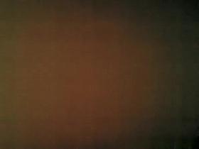 Woman in black leggings in supermarket