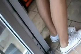 Hidden camera video and a great upskirt shot of a cute slim