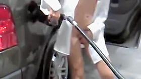 Sexy petrol station worker teases clients with naked charms