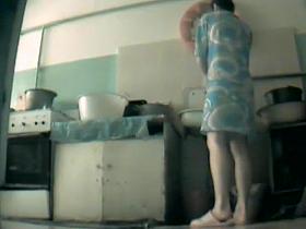 Poor woman spied as she washes herself