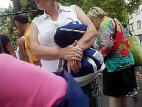 Chick in glasses and purple top down blouse