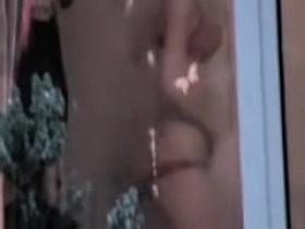 Neighbor is undressing on the window voyeur video