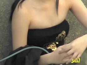 Foxy petite Japanese chick flashes her tits when sharking lad pulls down her top