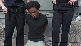 Horny milf cops arrest peeping tom on a rooftop for spying on women