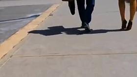 High heels in Morocco shiny black stilettos under the sun