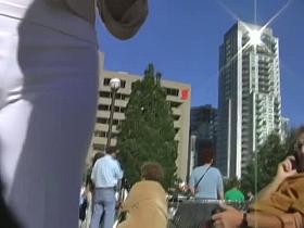 Street candid babe in white pants is looking great