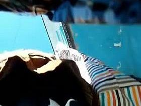 A brunette wearing granny panties walking down the street upskirt vid