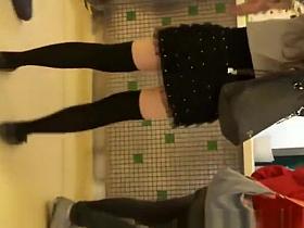 Black panties under short black dress