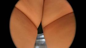 Intriguing upskirt shots of an enthralling behind