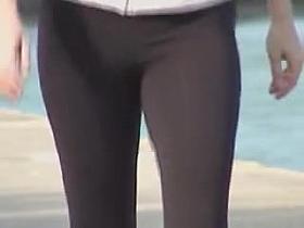 Street candid girl is going to ride her bicycle before cam 03t