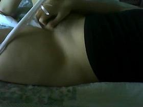 Rubbing her love tunnel with Pants on