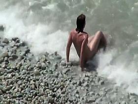 Pretty woman spied on the beach