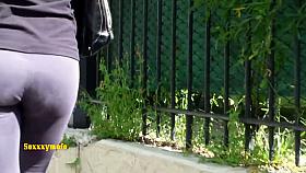 Juicy ass in black tights wiggling around candid camera