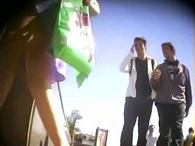 Filming pretty chicks in short skirts in various places