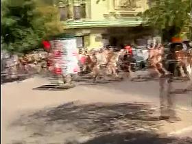 Nudists take a stroll through the city streets