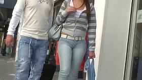 Brunette flaunts her massive booty in jeans for the candid cam
