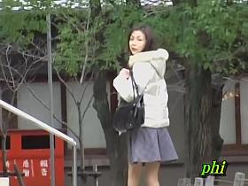 Slim slutty chick flashes her hairy snatch when some sharking lad lifts her skirt