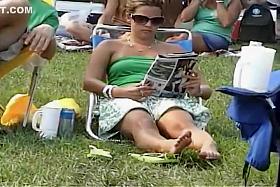 Upskirt view on the park grass