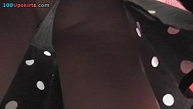 Upskirt porn with amateur auburn gal in a public place