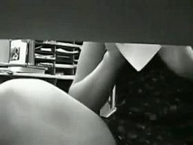 Young brunette girl up skirt at work