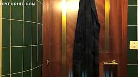 Cute girl changing in bathroom