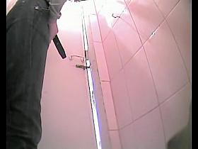 Girl approaches her round butt to the toilet cam and pisses