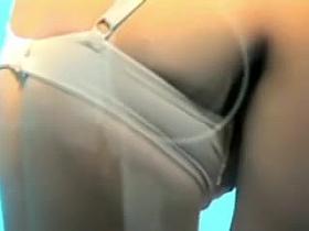 Full tits with big light nipples in the changing cabin