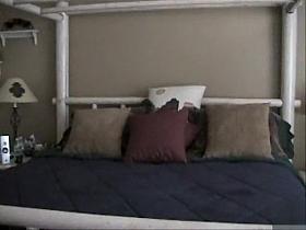 Housewife takes a shower and masturbates in voyeur clip