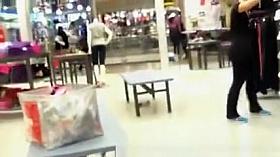 Clothe store worker in tight pants