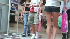 Four extremely hot sexy legs in this street candid video