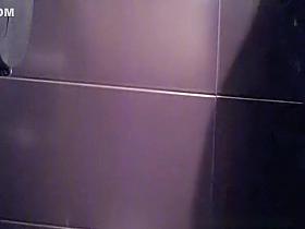 Girl in tight jeans peeing