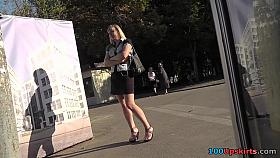 Sexy upskirt black panties of the girl on the bus stop