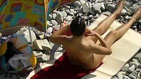 Smooth woman enjoys sunbathing