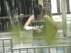 A sexy sharking asian girls nipple peek of in public