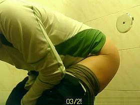 Woman pulls down pants to pee