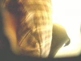 Street camera looking up skirts to show a pantyless ass