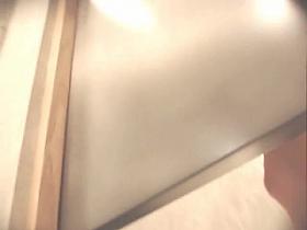 Fun with a naked girl in a shop changing room