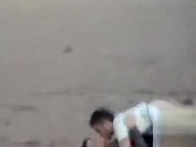 German couple makes love on the deserted beach