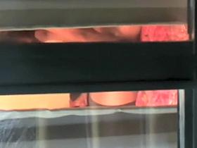 Tattooed girl teases with her ass