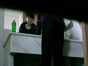 An alluring Asian chick caught on a voyeur spy cam video pissing